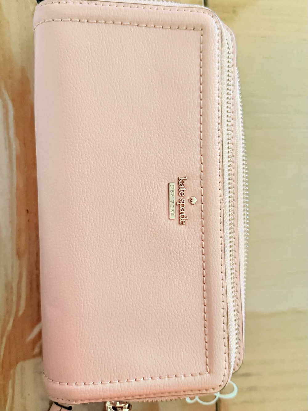 kate spade Pale Blush Leather Zip-Around Wallet with Gold Logo